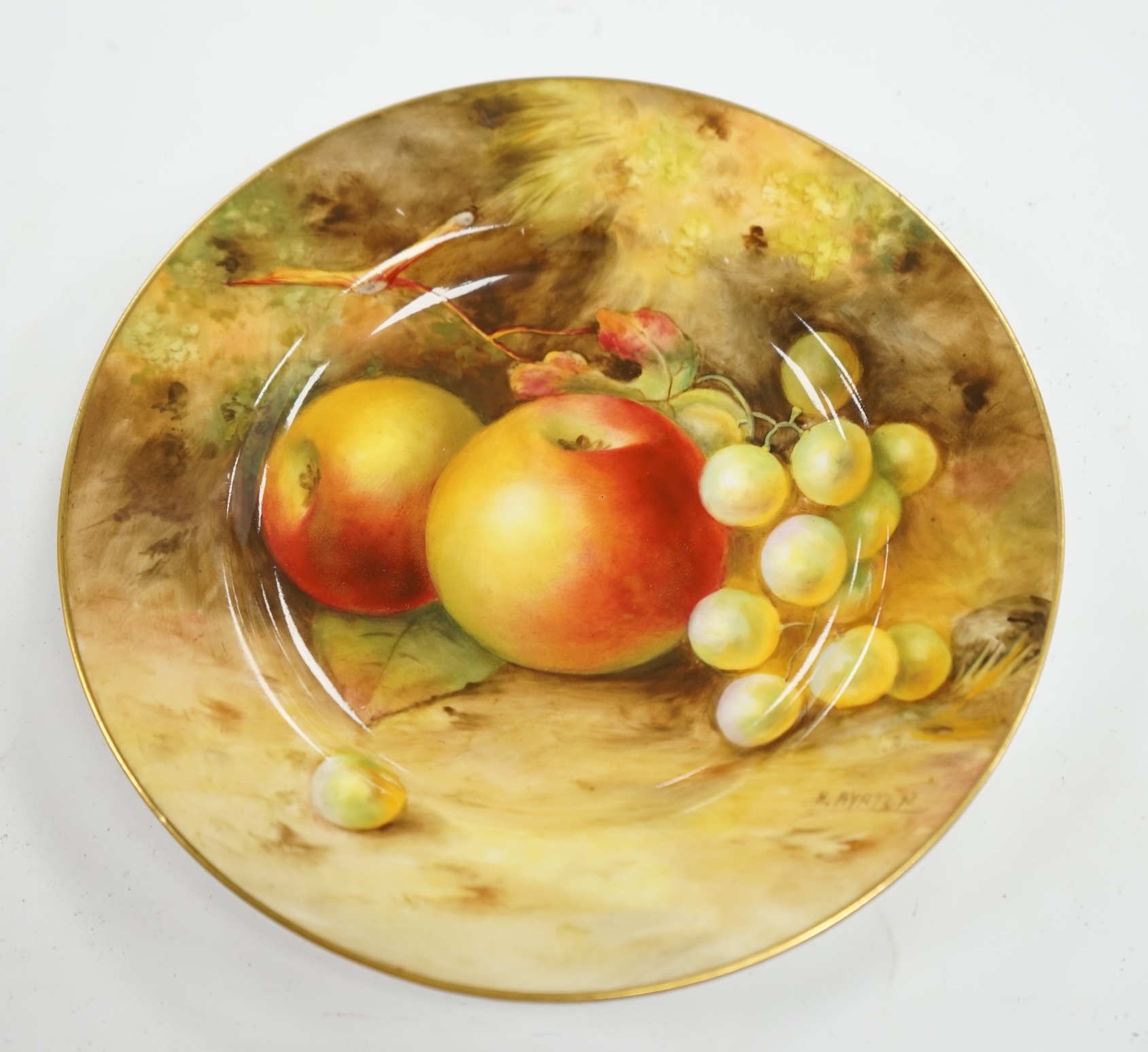 A Worcester cabinet plate, signed Ayrton, decorated with fruit, 15.5cm diameter. Condition - good